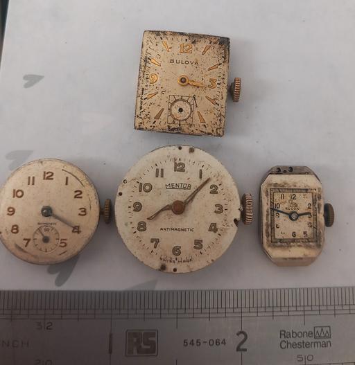  — collection of four vintage mechanical watchs