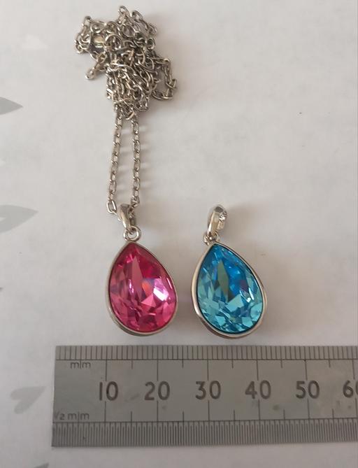  — Large faceted silver plated crystal pendants