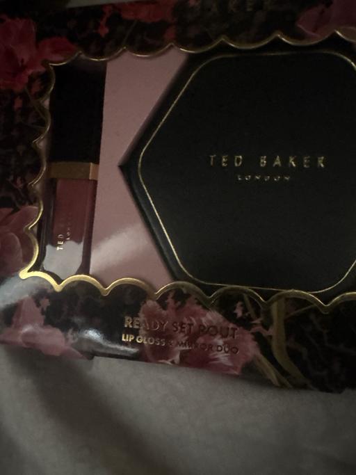  — ted baker