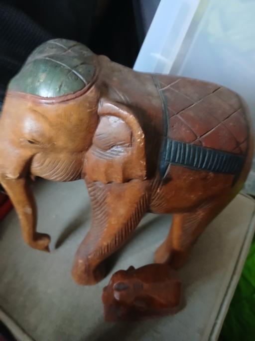  — sold wood heavy elephant and baby