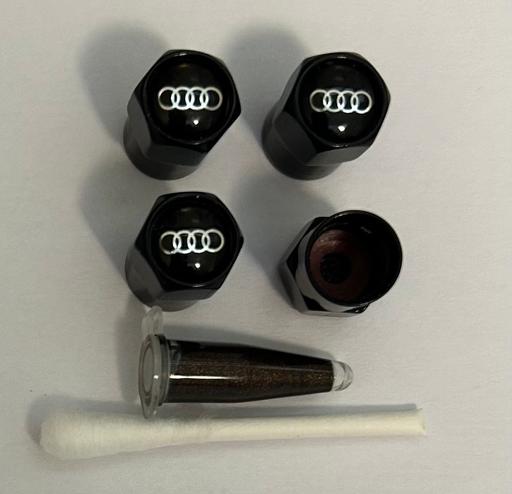  — Audi Tyre valve caps with grease