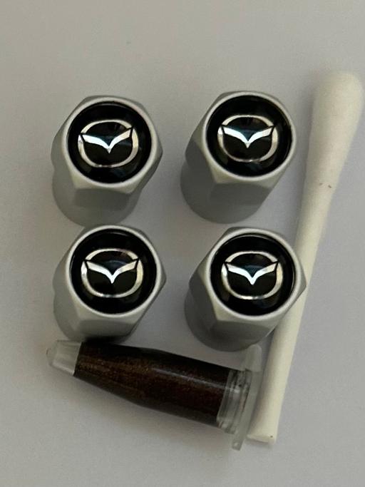  — Mazda 5 Tyre valve caps with grease