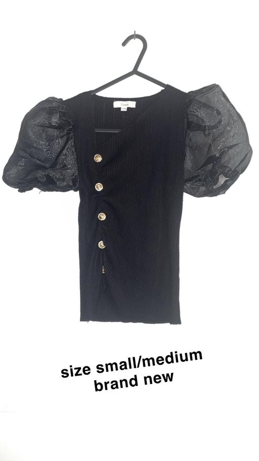  — Size s/m women’s brand new top