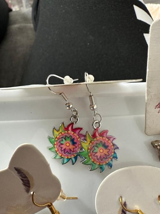  — Earrings
