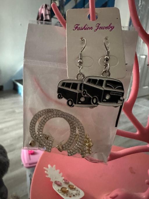  — Earrings