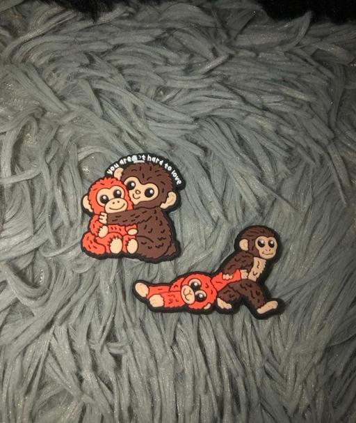  — Punch monkey croc charms