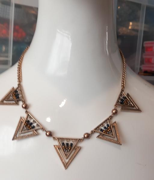  — Opia Gold Tone Geometric Triangle necklace