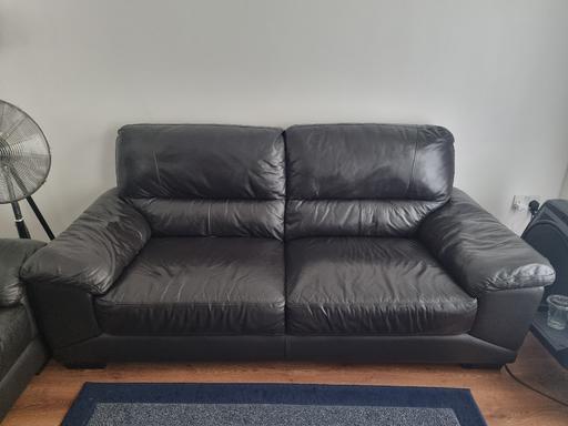  — Black Leather Sofas