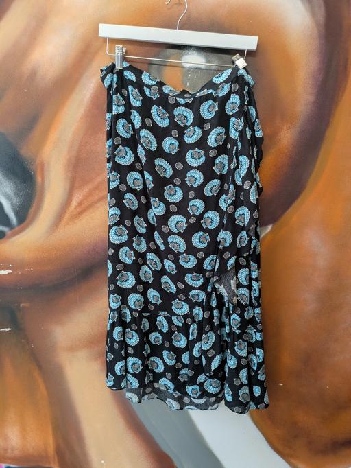  — women's wrap around skirt with shell detail