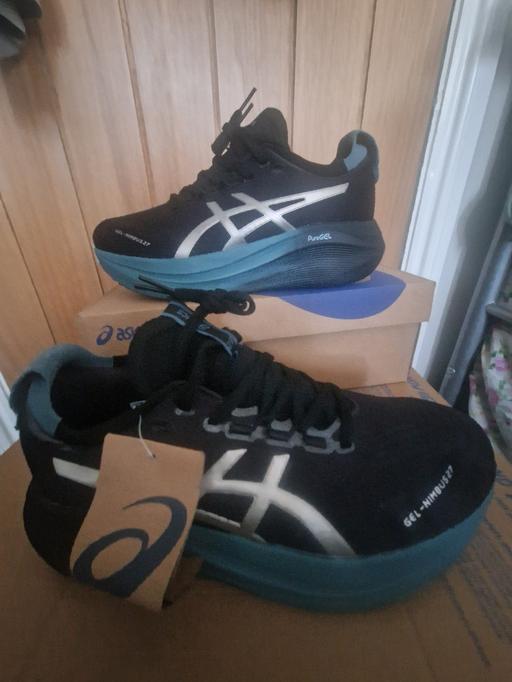  — asics