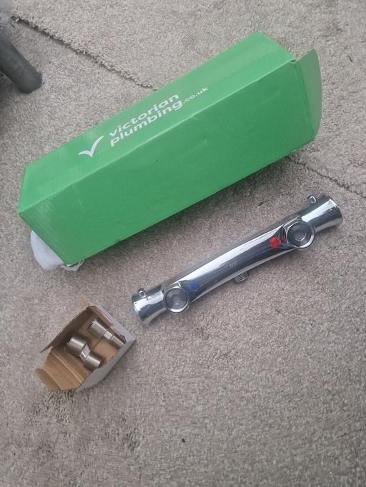  — shower thermostatic bar