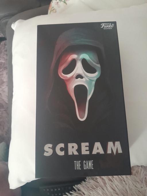  — Scream trilogy 3 DVDs and a scream board game