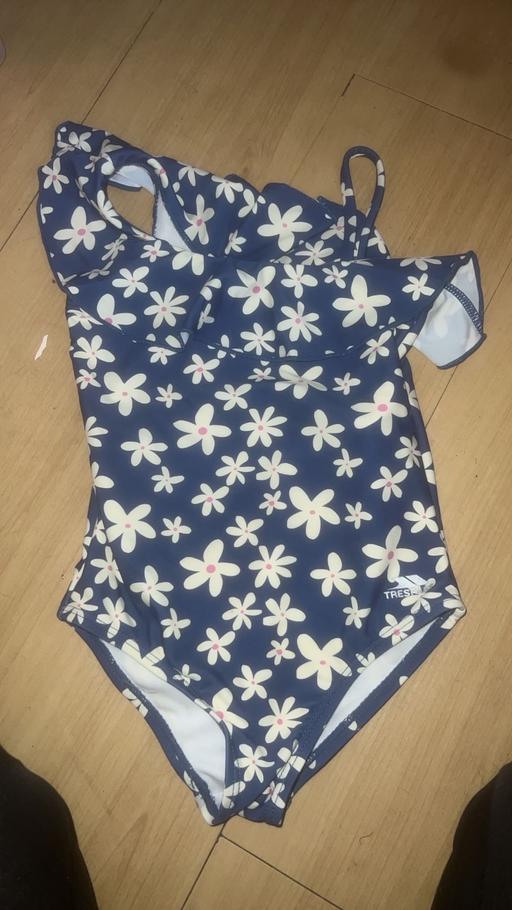  — swimming costume
