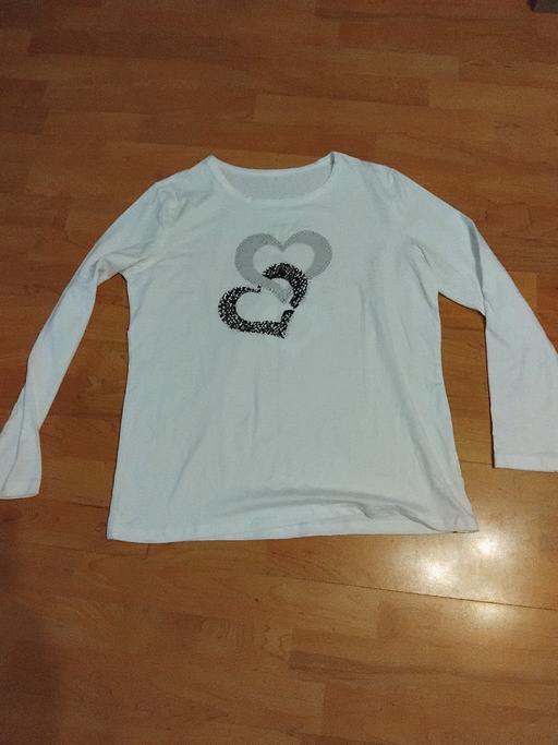  — New Top L.