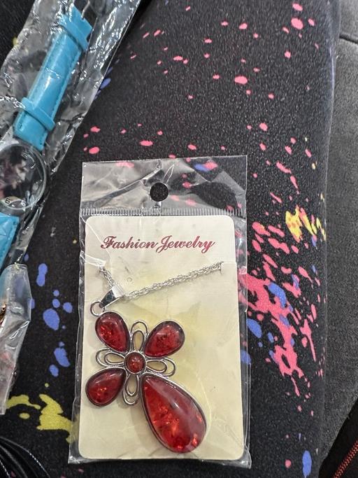 — Faux amber cross