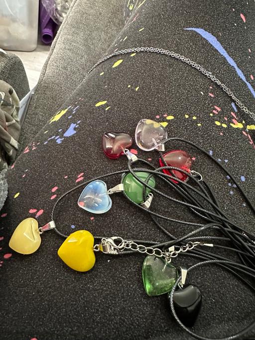  — Multi coloured. Glass or agate pendants