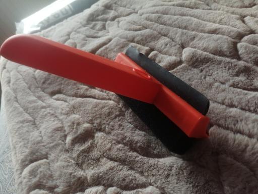  — New ice scraper