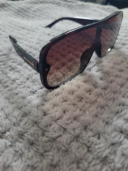  — sunglasses