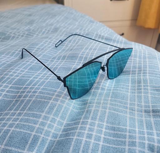  — sunglasses