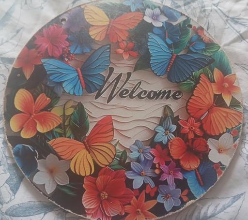  — Plaque  )