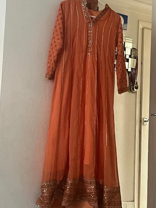  — Dress