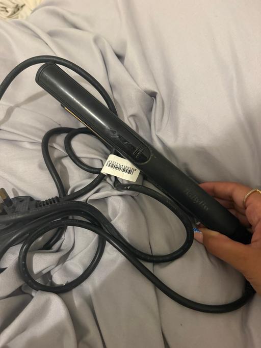  — Straightener