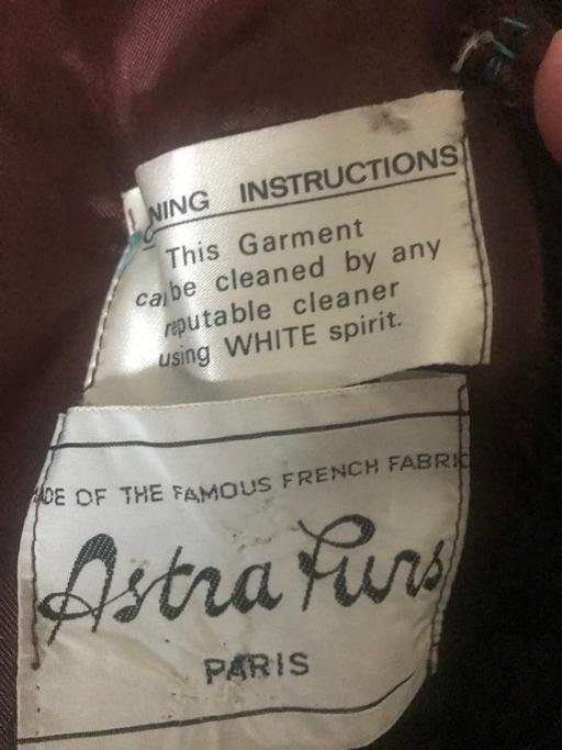  — Astra can coat