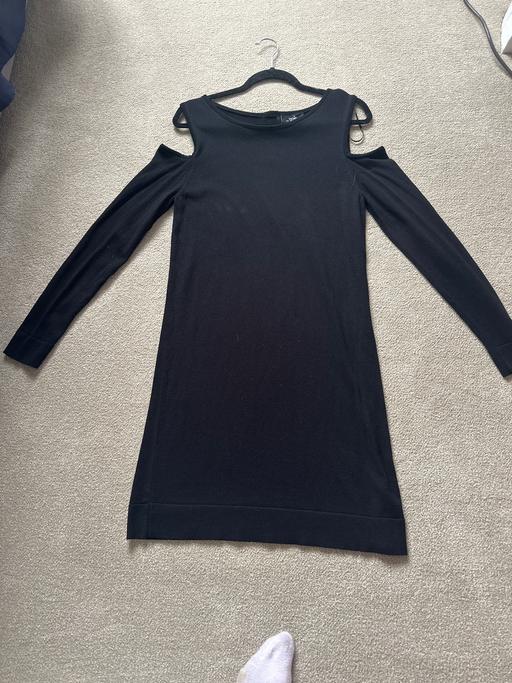  — Dress