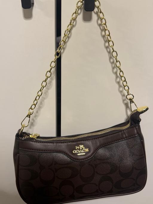  — Hand bag