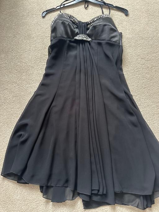  — Dress