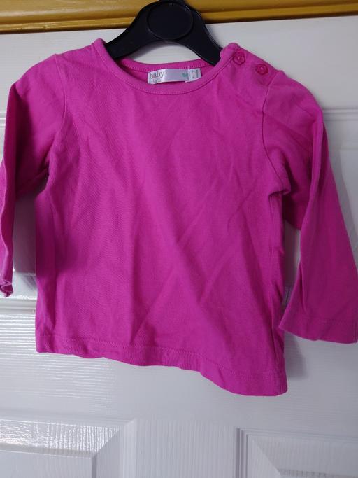  — Baby girls pink top size 9-12 months