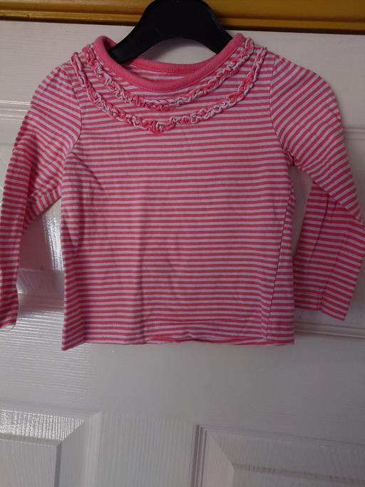  — Baby girls pink stripey top size 9-12 months