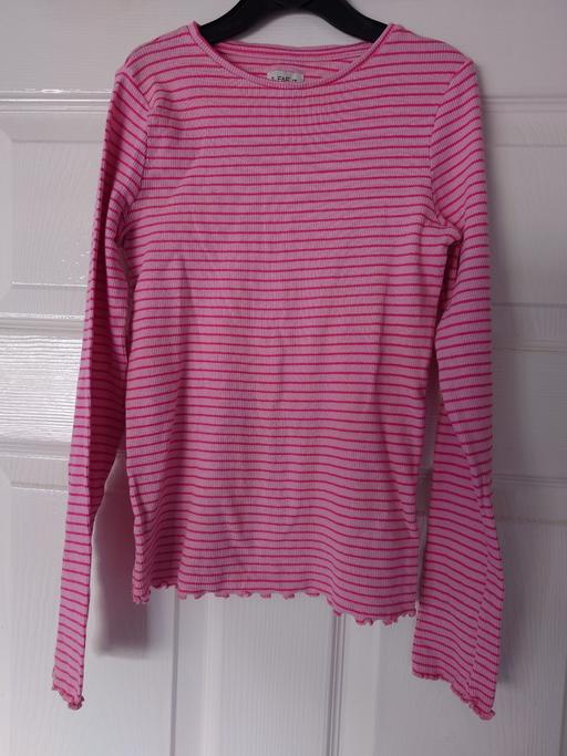  — Girls pink stripey top size 9-10 years