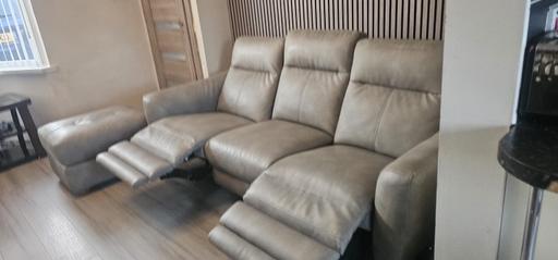 — Reclining leather sofa