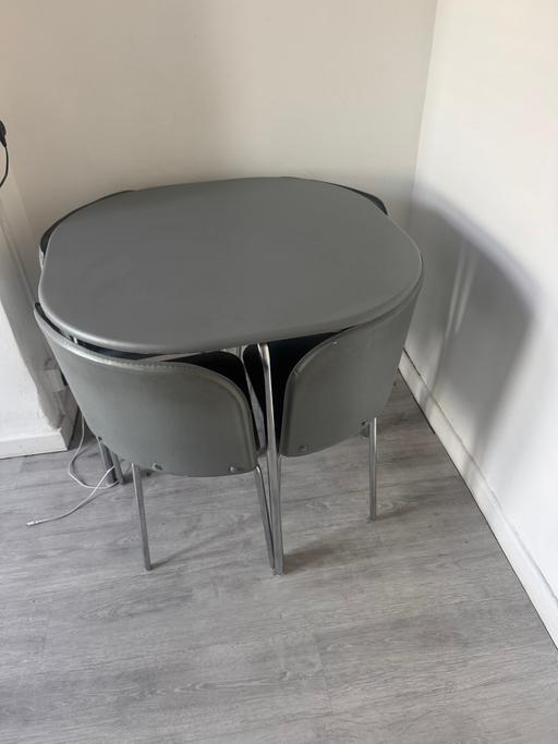  — Grey set of Dining Table and chairs
