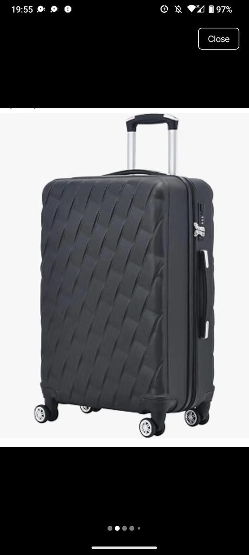  — 24  inch 57 lt suit case