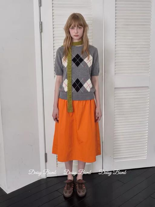  — Orange Skirt