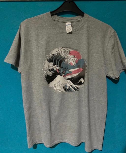  — Ladies grey Stitch surfing T-shirt. Size L