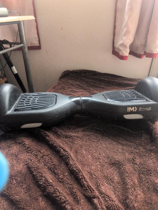 — Hoverboard and charger. £40 ono