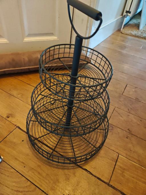  — Metal wire basket stand with three tiers