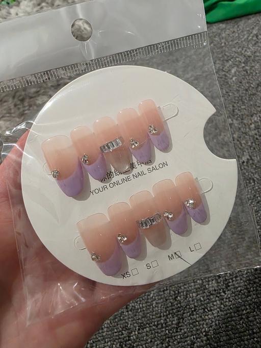  — Press on nails