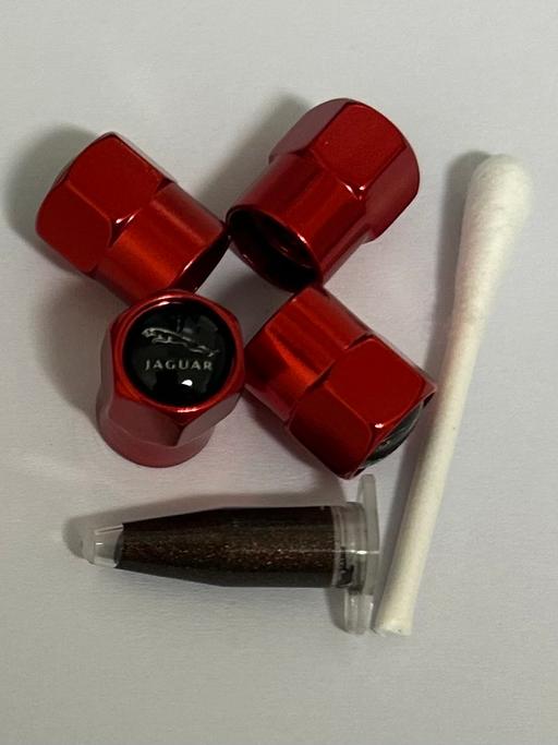  — Jaguar Tyre valve caps with grease