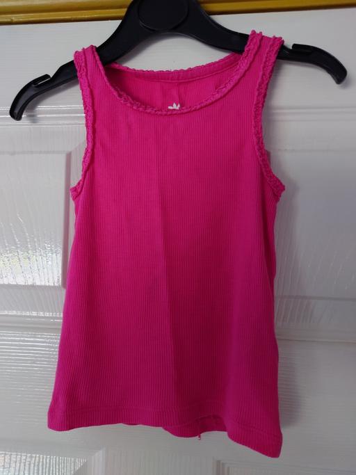  — Girls pink vest top size 12-18 months
