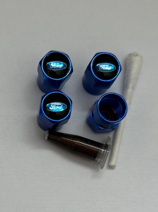  — Ford Tyre valve covers with grease