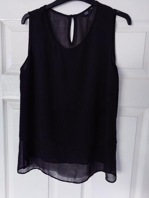  — Women's black sleeveless top size 14