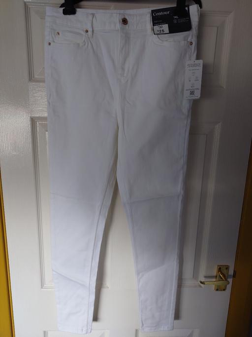  — Women's white denim jeans size 14
