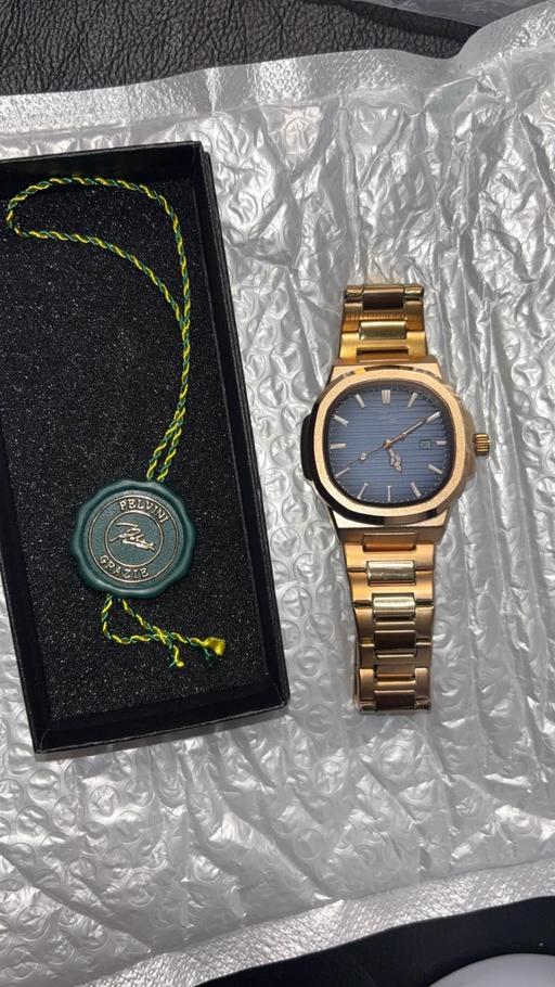  — Pelvini Rose gold watch with a navy blue face