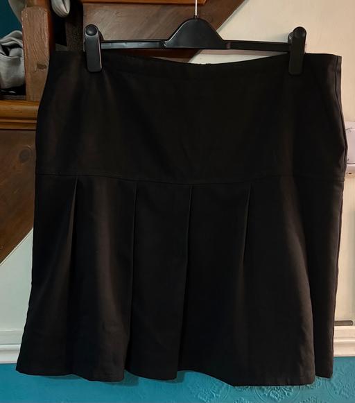  — Drop pleat black school skirt. Size 38