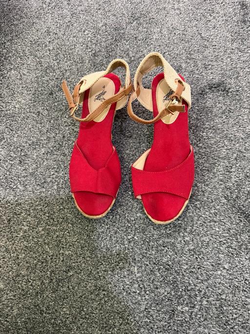  — Red sandals