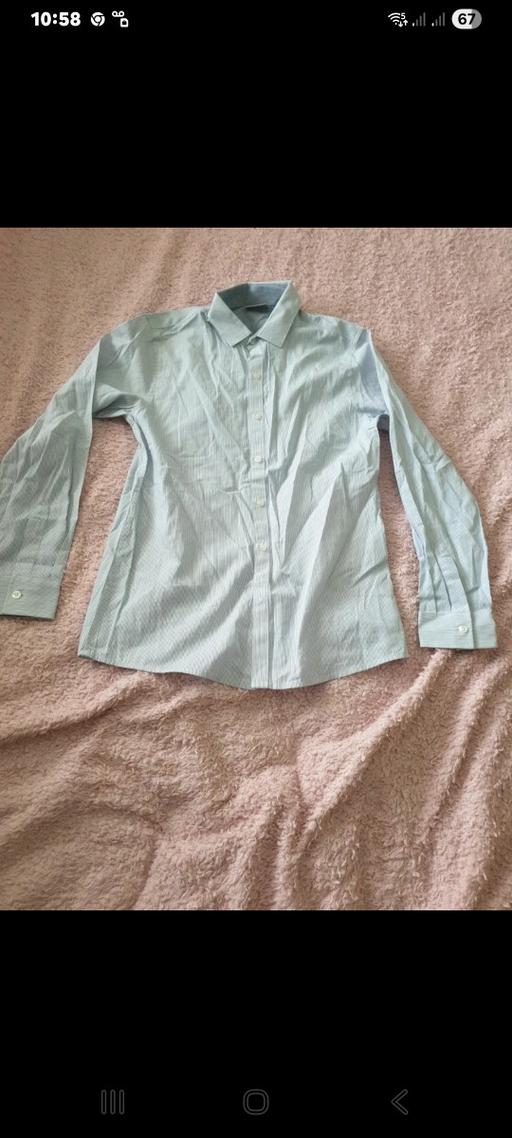  — Shirt 11Y.